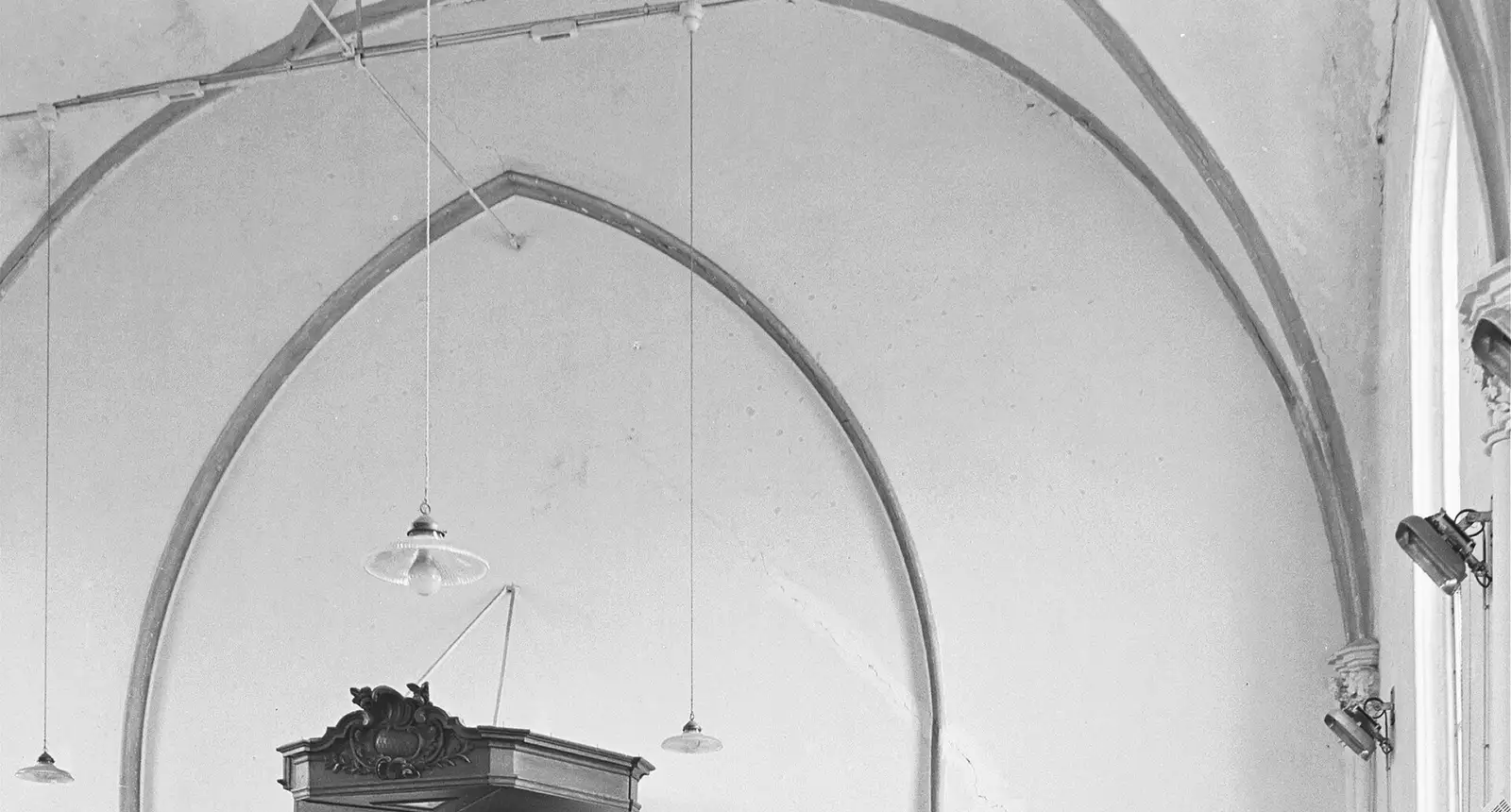 The nave of a Reformed church, looking towards the pulpit.